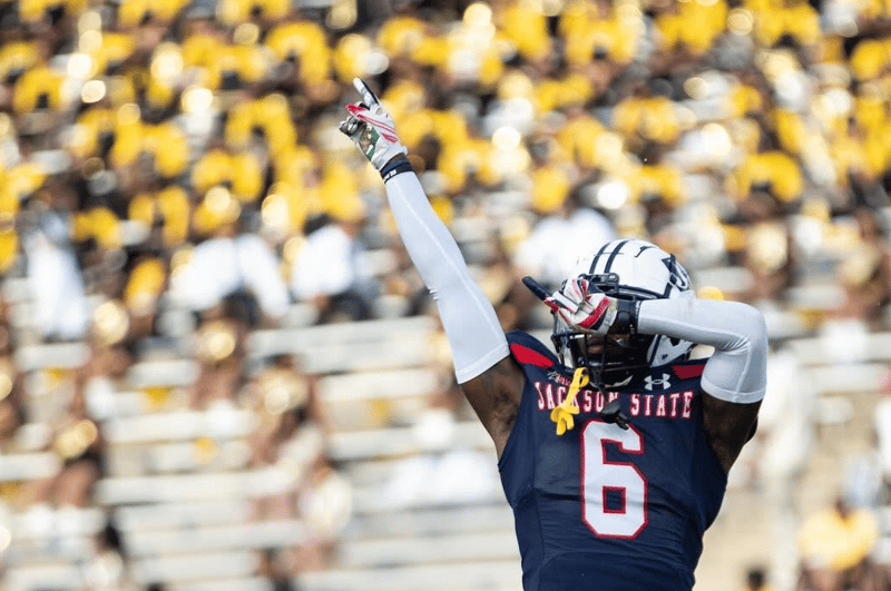 JSU football player and fans