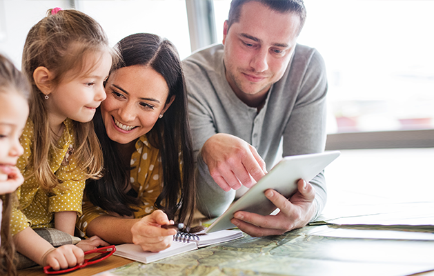 Friends laughing at a gathering.