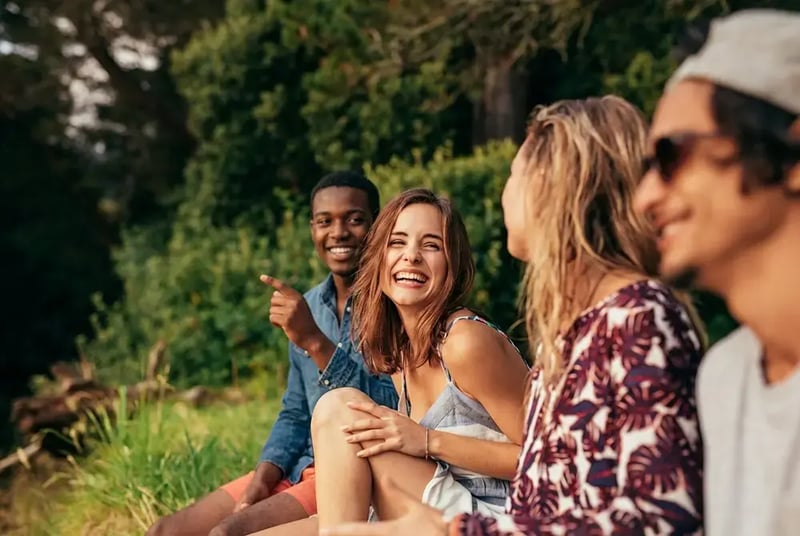 Group of friends laughing and talking.
