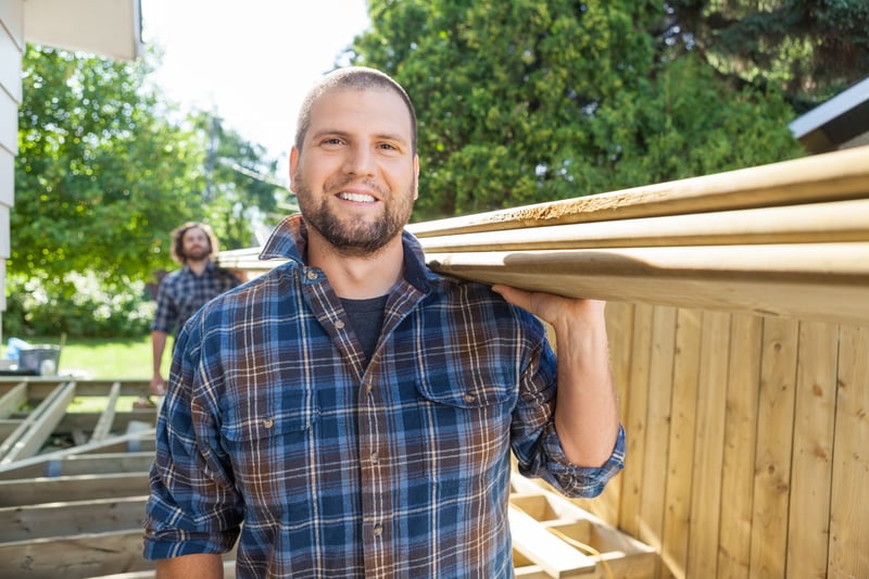 Two men on a construction site.