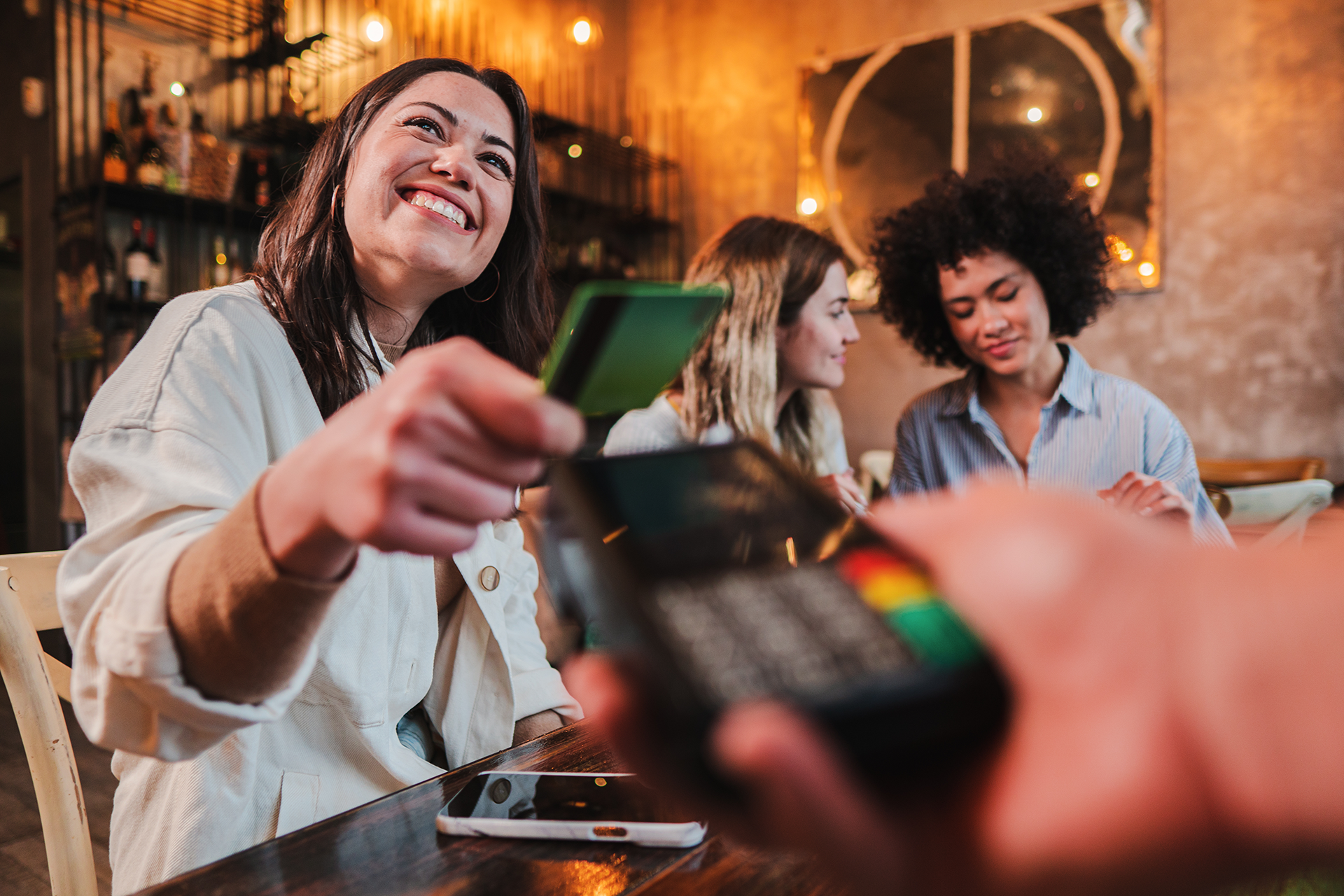 Using a credit card to pay for purchases.