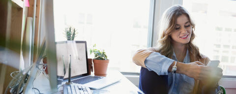 young-woman-office-electronic-devices