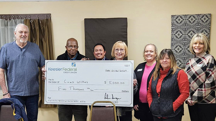 Camp Wilkes check presentation